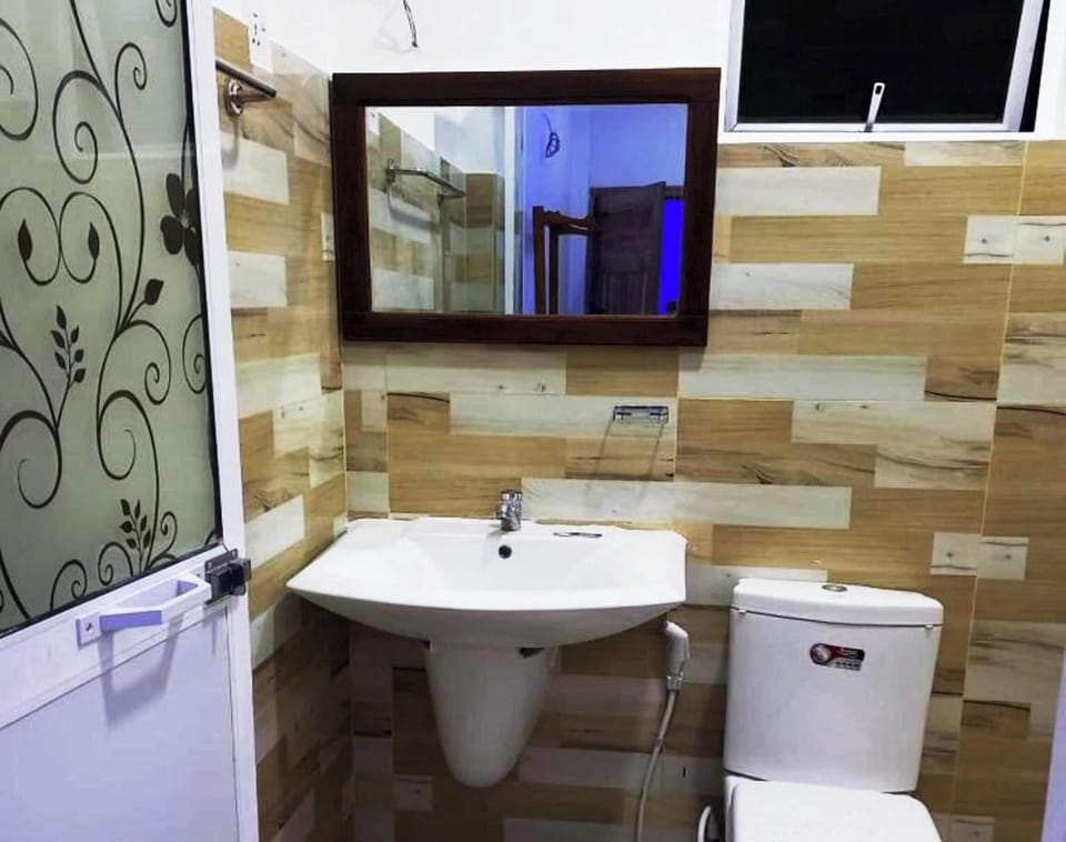 Family Triple Room, Garden View | Bathroom | Shower, free toiletries, hair dryer, bathrobes