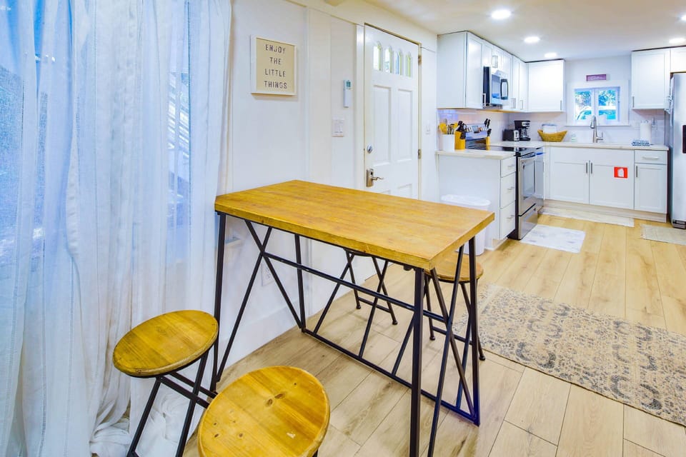 When you enter the front door, you will find the kitchen and dining area.