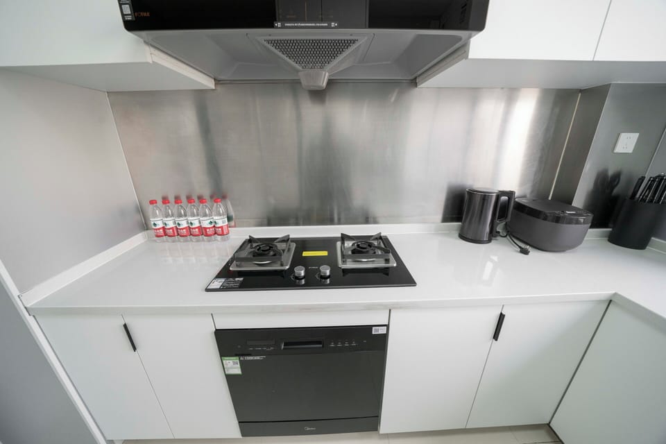 Fridge, microwave, stovetop, cookware/dishes/utensils