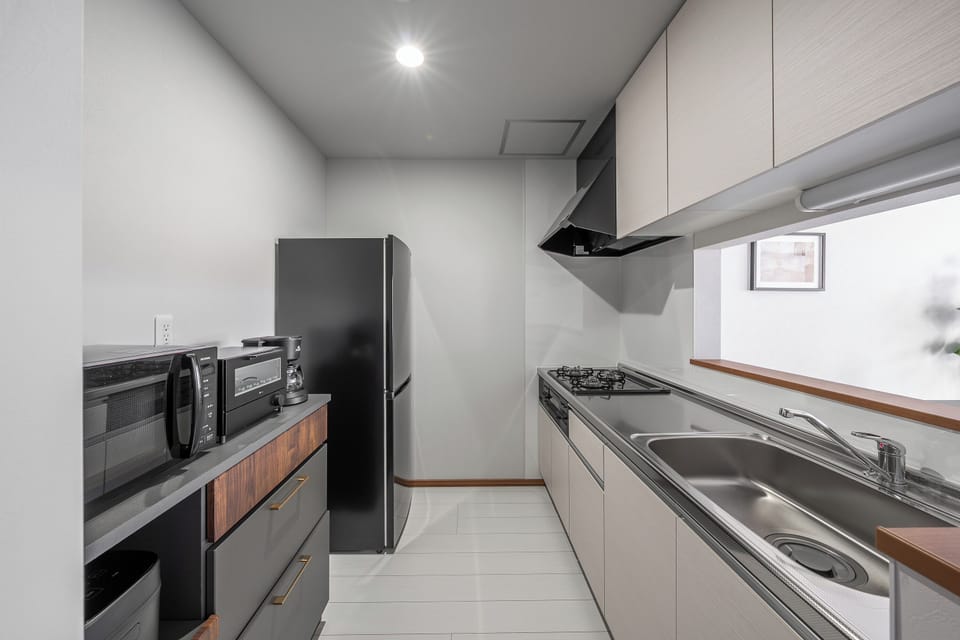 Apartment | Private kitchen | Fridge, microwave, stovetop, rice cooker