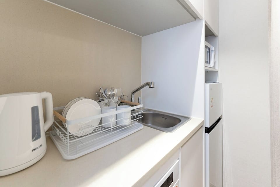 Fridge, microwave, highchair, cookware/dishes/utensils