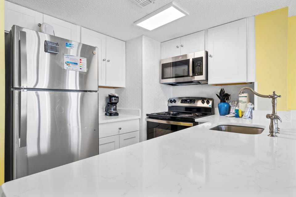 Signature Condo, 2 Bedrooms, Patio, Beach View | Private kitchen | Coffee/tea maker, fridge, microwave, oven