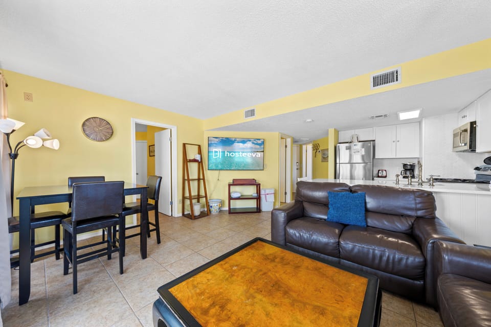 Signature Condo, 2 Bedrooms, Patio, Beach View | Living room | 50-inch Smart TV with cable channels