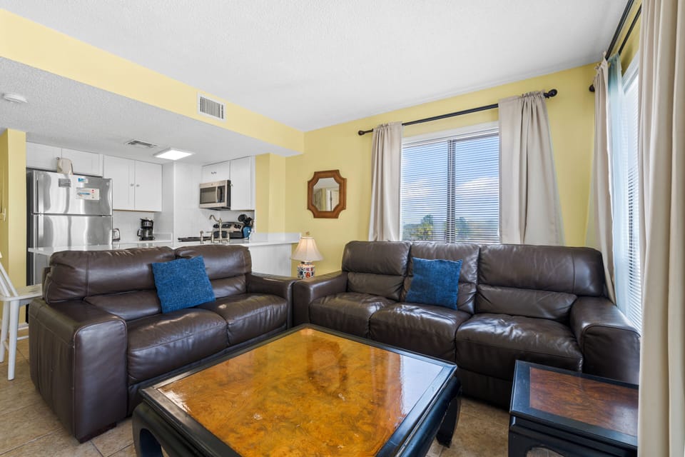 Signature Condo, 2 Bedrooms, Patio, Beach View | Living room | 50-inch Smart TV with cable channels
