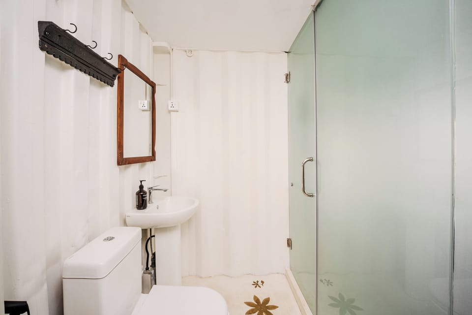 Double Room, Private Bathroom | Bathroom | Shower, free toiletries, hair dryer, bathrobes