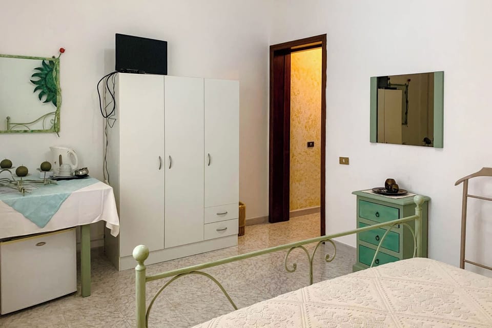 Classic Apartment, Garden View | Desk, laptop workspace, blackout drapes, iron/ironing board