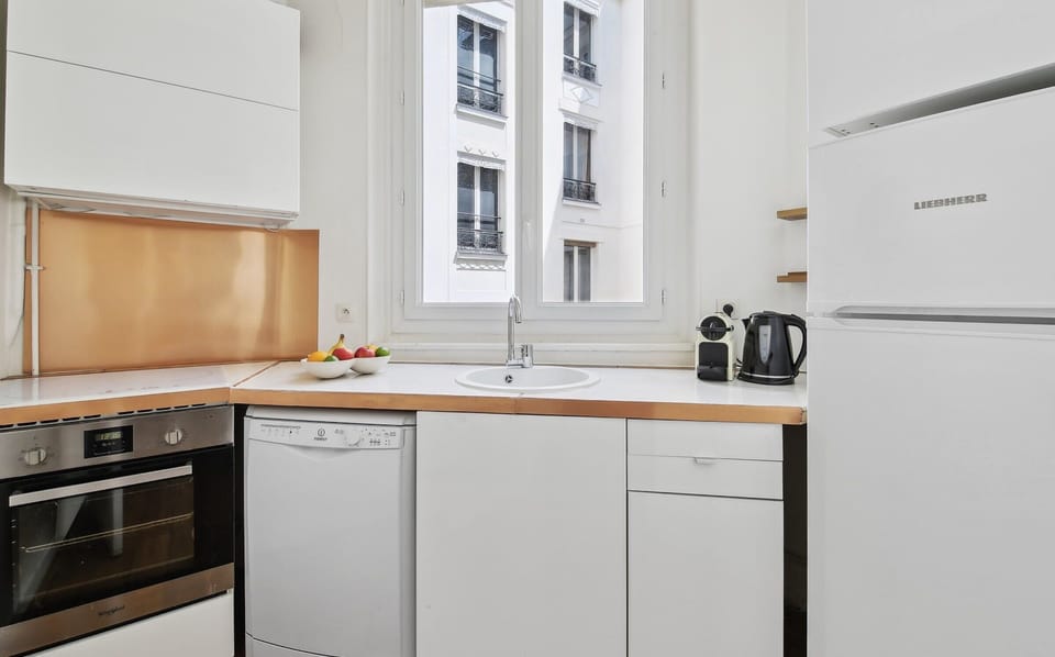 The kitchen is fully equipped to prepare a simple meal