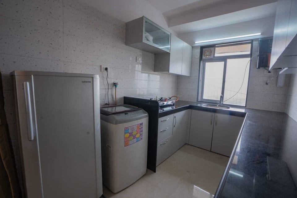 Double or Twin Room, City View | Private kitchen | Fridge, microwave, oven, stovetop