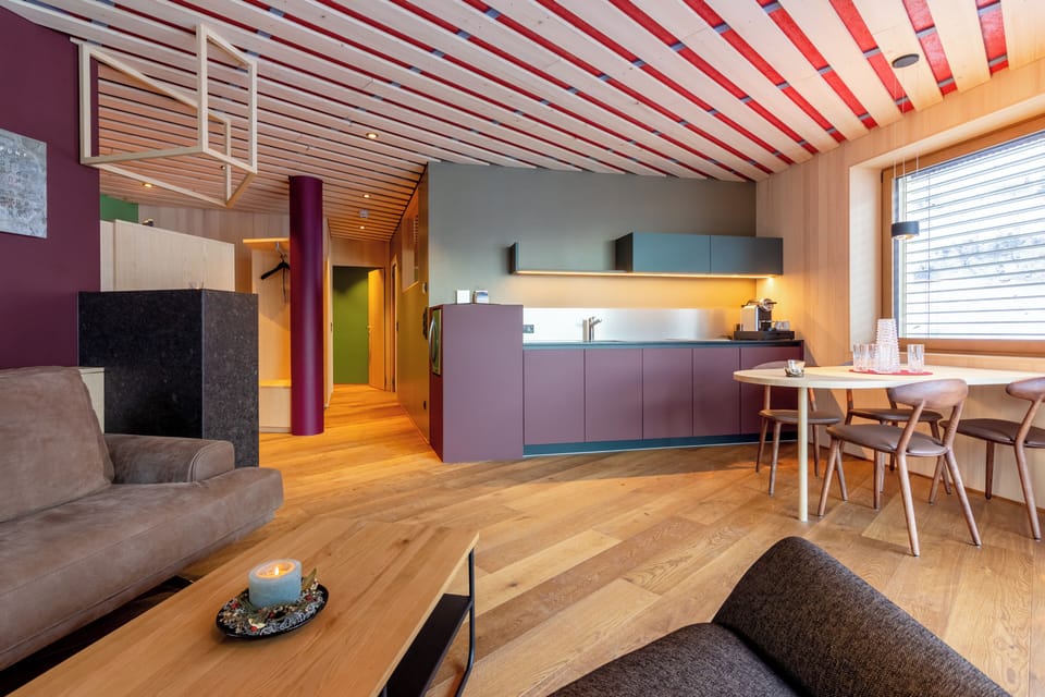 Deluxe Suite, Balcony, Mountain View | Premium bedding, minibar, in-room safe, laptop workspace