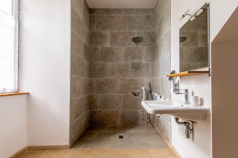 Comfort Room, Garden View | Accessible bathroom