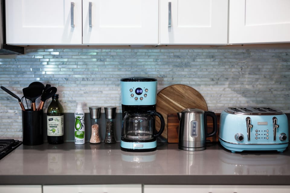 Start your day in style with our designer coffee pot and toaster