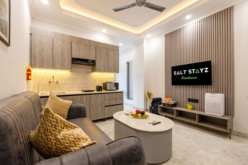Luxury Suite | Living area | 42-inch Smart TV with digital channels