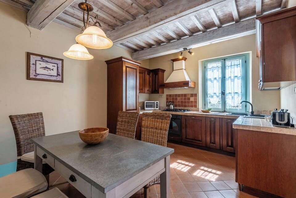 Furniture, Interior Design, Kitchen, Countertop, Cabinetry, Flooring, Wood, Ceiling, Floor, Room