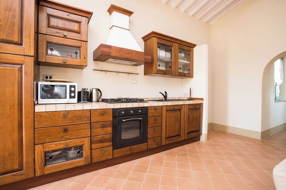 Cabinetry, Flooring, Wood, Kitchen, Furniture, Interior Design, Countertop, Major Appliance, Floor, Cupboard