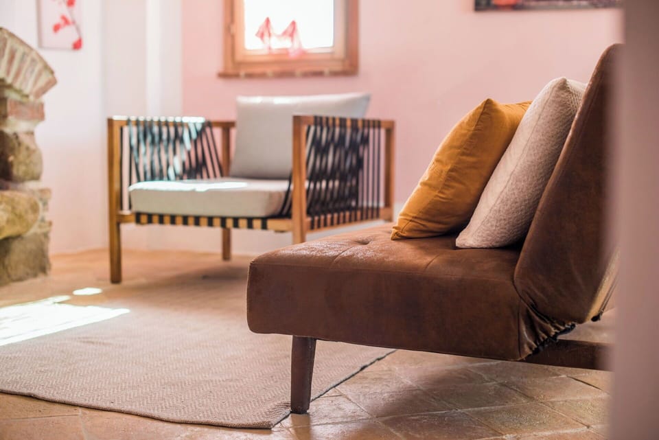 Furniture, Interior Design, Wood, Couch, Flooring, Textile, Floor, Cushion, Living Room, Throw Pillow