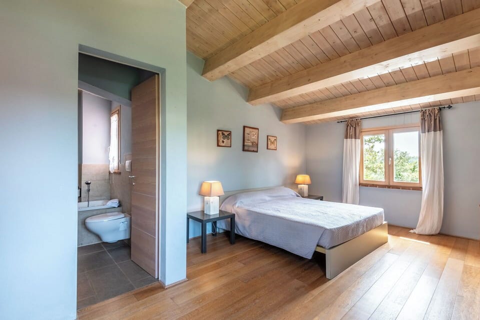 Furniture, Interior Design, Bed, Flooring, Floor, Bedroom, Wall, Wood, Ceiling, Room