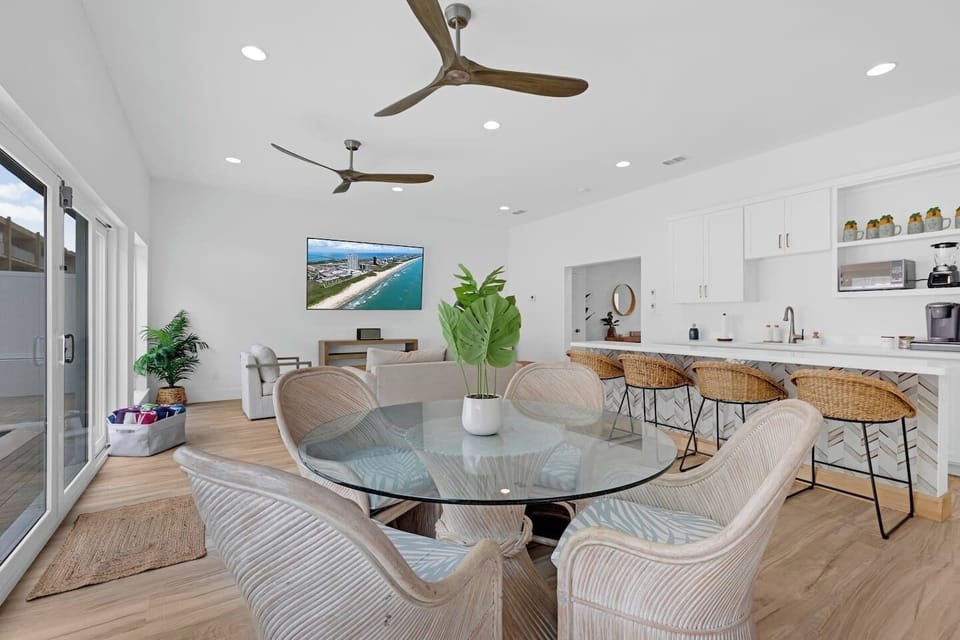 The first floor entertainment room gives you the ability to spend time outside in the pool and hot tub while having easy access to a kitchenette, dining area, full bathroom, and living room. Grill outside and have everything you need just steps away!