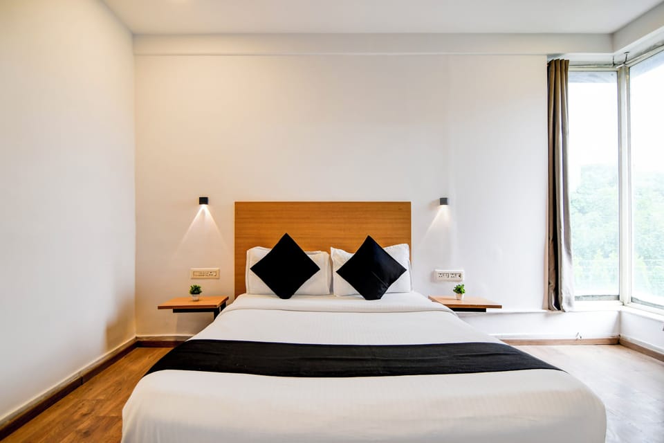 Deluxe Double Room, City View | In-room safe, desk, laptop workspace, blackout drapes
