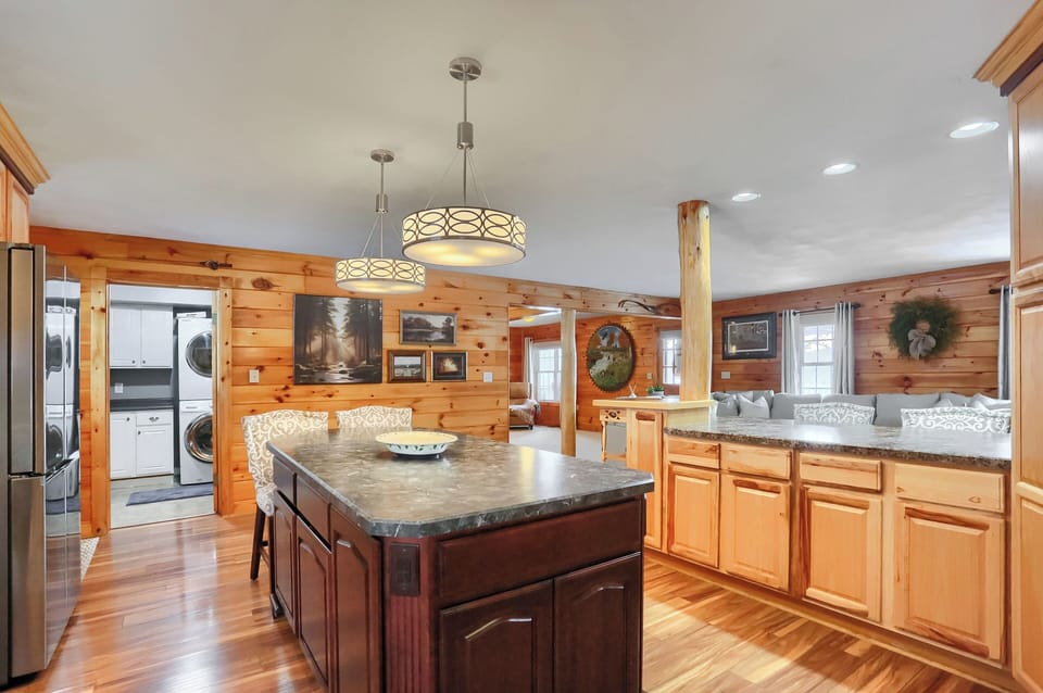 Spacious fully equipped kitchen with bar and island seating