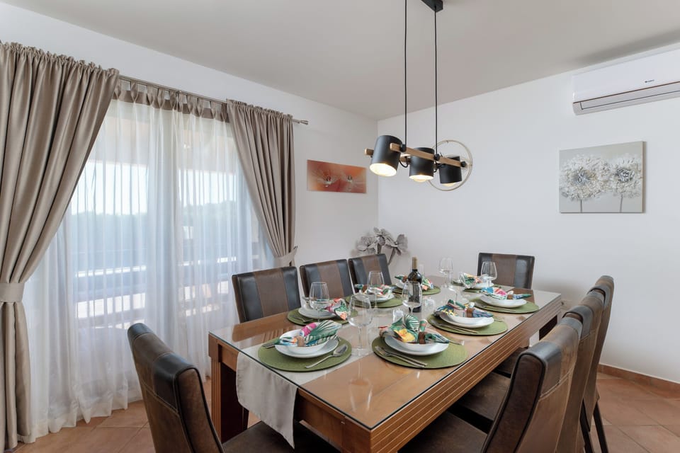"Elegant dining area with a warm, inviting atmosphere."
