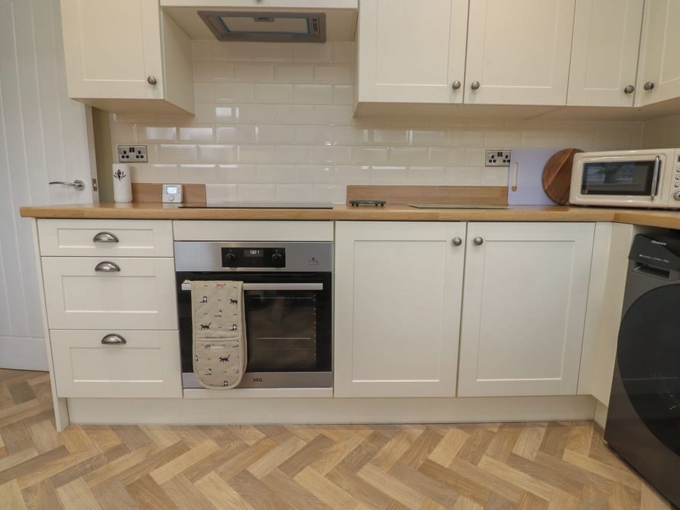 Fridge, microwave, toaster, cookware/dishes/utensils