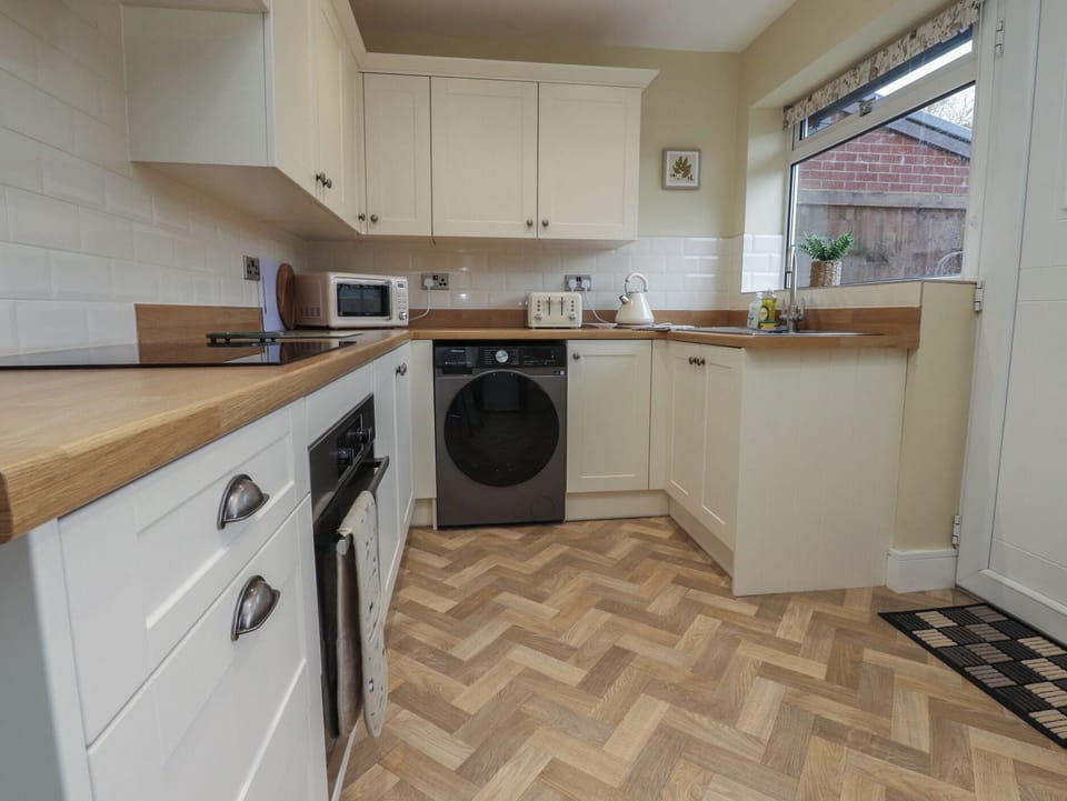 Fridge, microwave, toaster, cookware/dishes/utensils