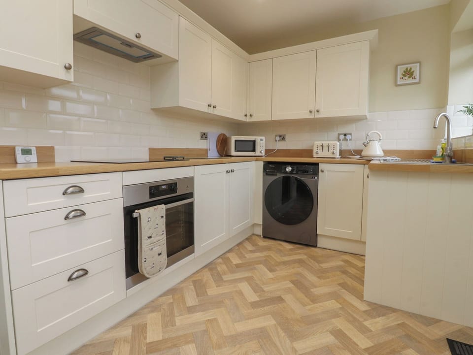 Fridge, microwave, toaster, cookware/dishes/utensils