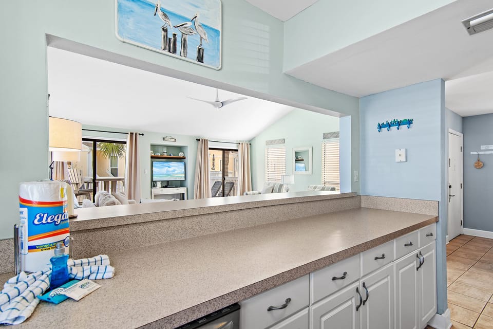 Kitchen with a view into the living room