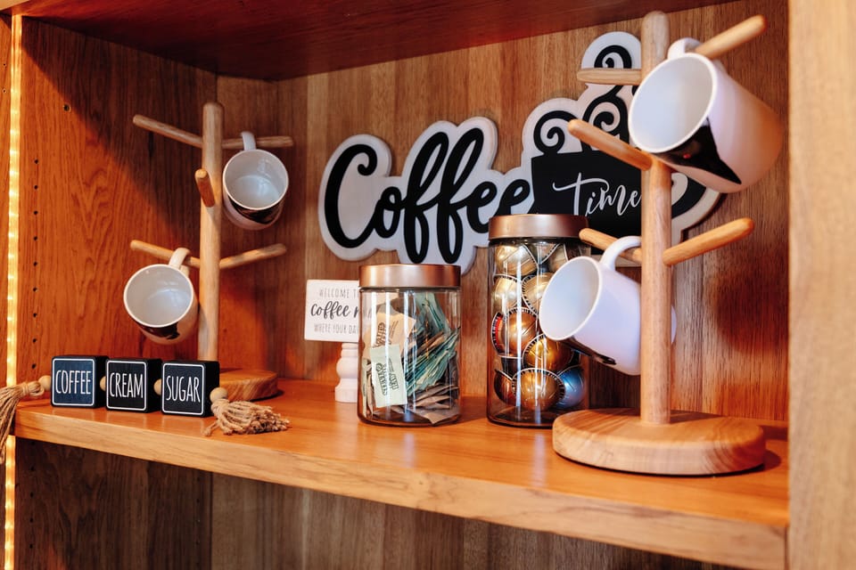 Coffee bar with a combo drip/Keurig coffee maker, and Nespresso machine