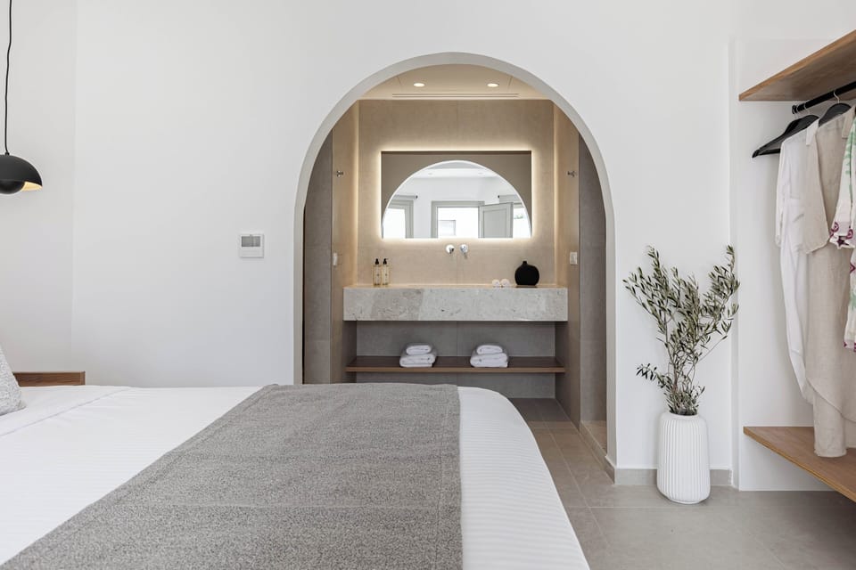 Junior Suite, Balcony, Resort View | Bathroom | Shower, hair dryer, slippers, towels