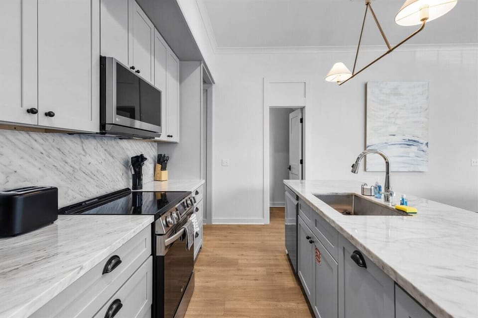 Cook, snack, and gather in the fully equipped kitchen