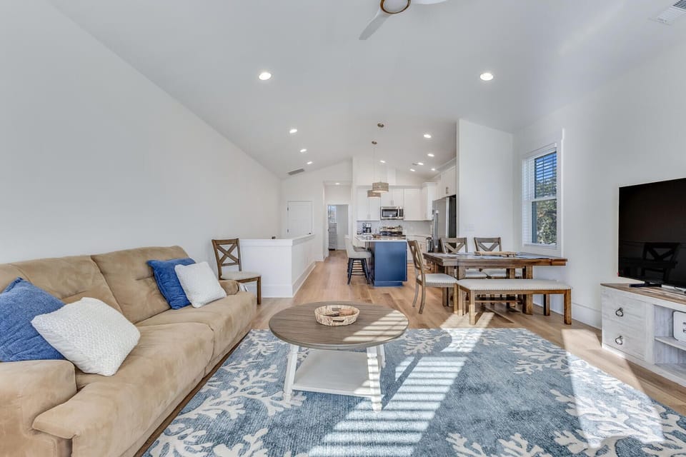 Relax in your bright, open-concept space where natural light floods through large windows, creating the perfect backdrop for memorable moments.