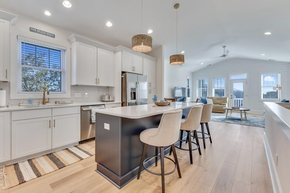 Your spacious open-concept kitchen flows seamlessly into the living area, perfect for gathering and creating memorable meals together.