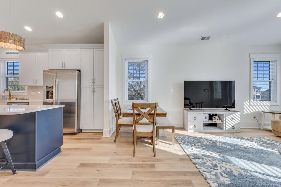 Your bright, open living space flows seamlessly from kitchen to dining to lounge, creating the perfect spot for relaxing or entertaining.