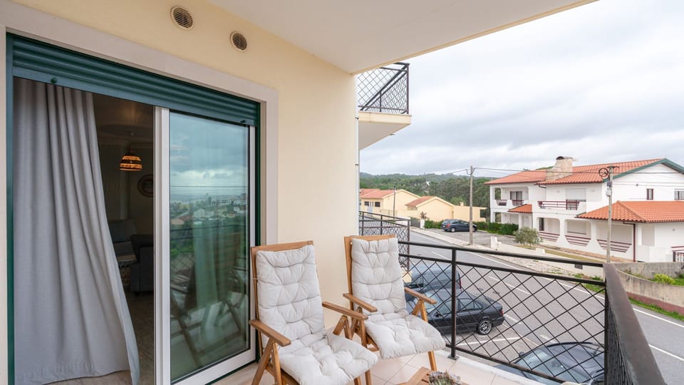 Enjoy morning coffee or a sunset drink on your private balcony with serene residential views. #PrivateBalcony #RelaxationSpot #CoastalLiving