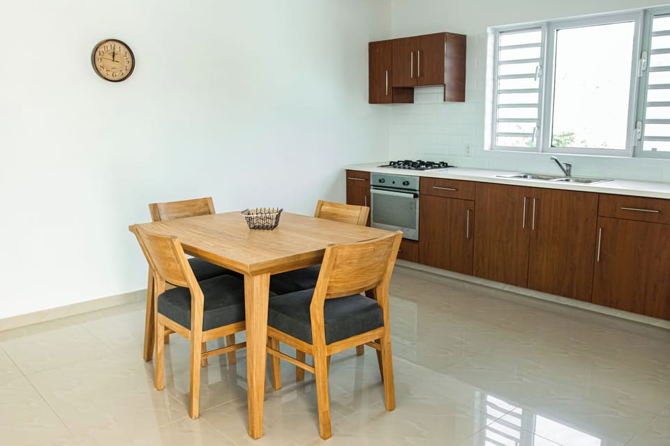 Apartment, Pool View | Private kitchen | Full-size fridge, microwave, oven, stovetop