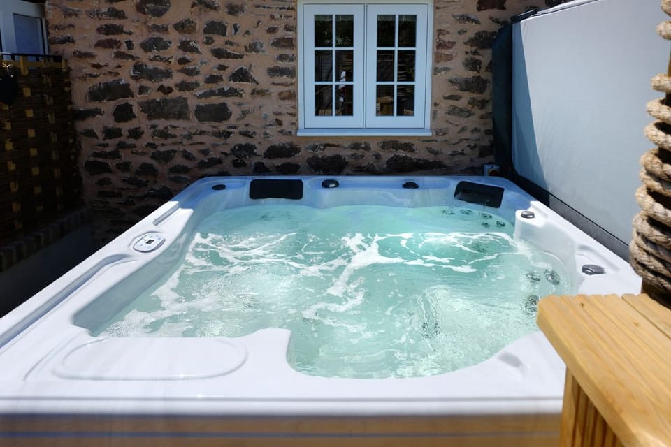 Enjoy quiet moments in your private hot tub just steps from your door.