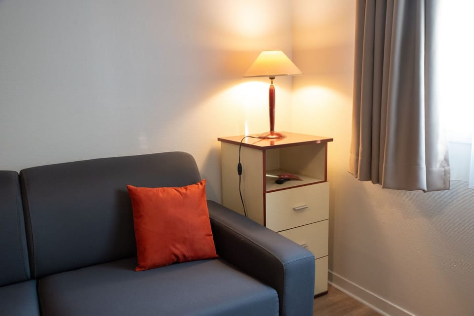 A cozy seating area offers a pleasant spot to unwind during your stay.