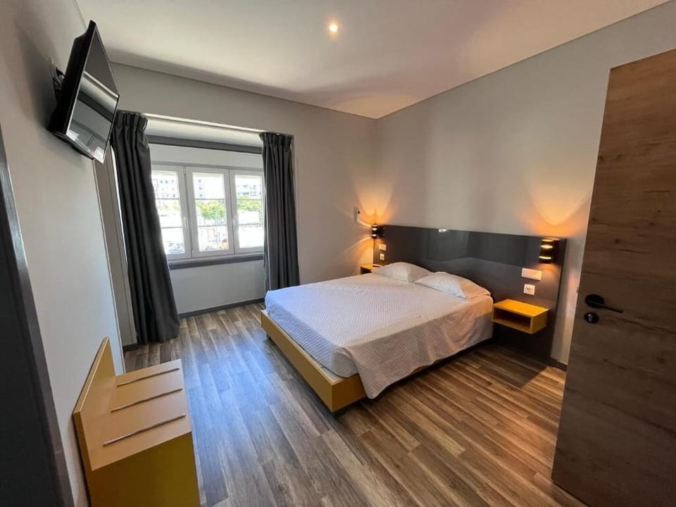 Family Room, City View | In-room safe, blackout drapes, free WiFi, wheelchair access