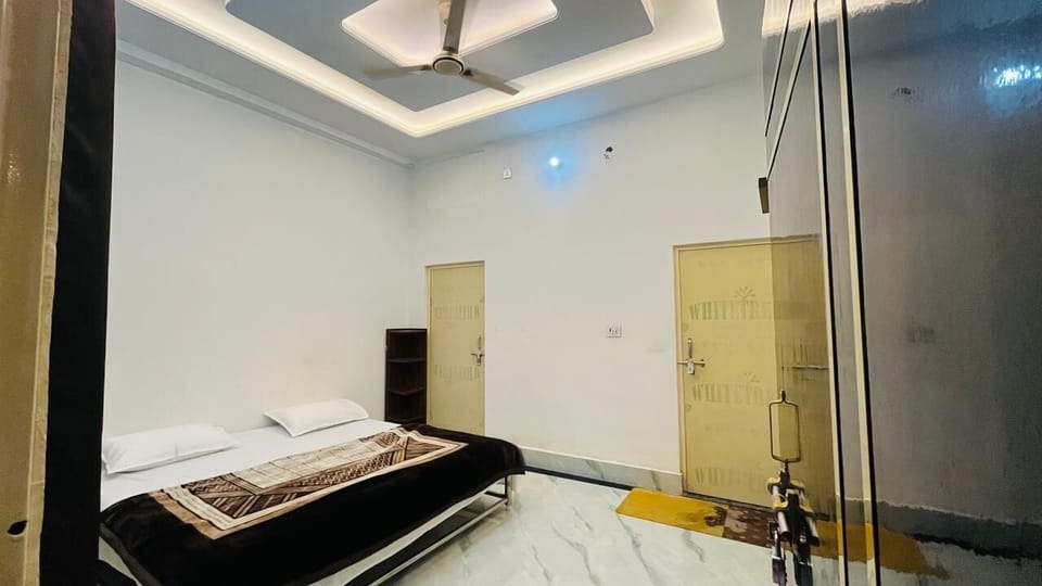 Deluxe Double Room, City View | In-room safe, desk, laptop workspace, blackout drapes