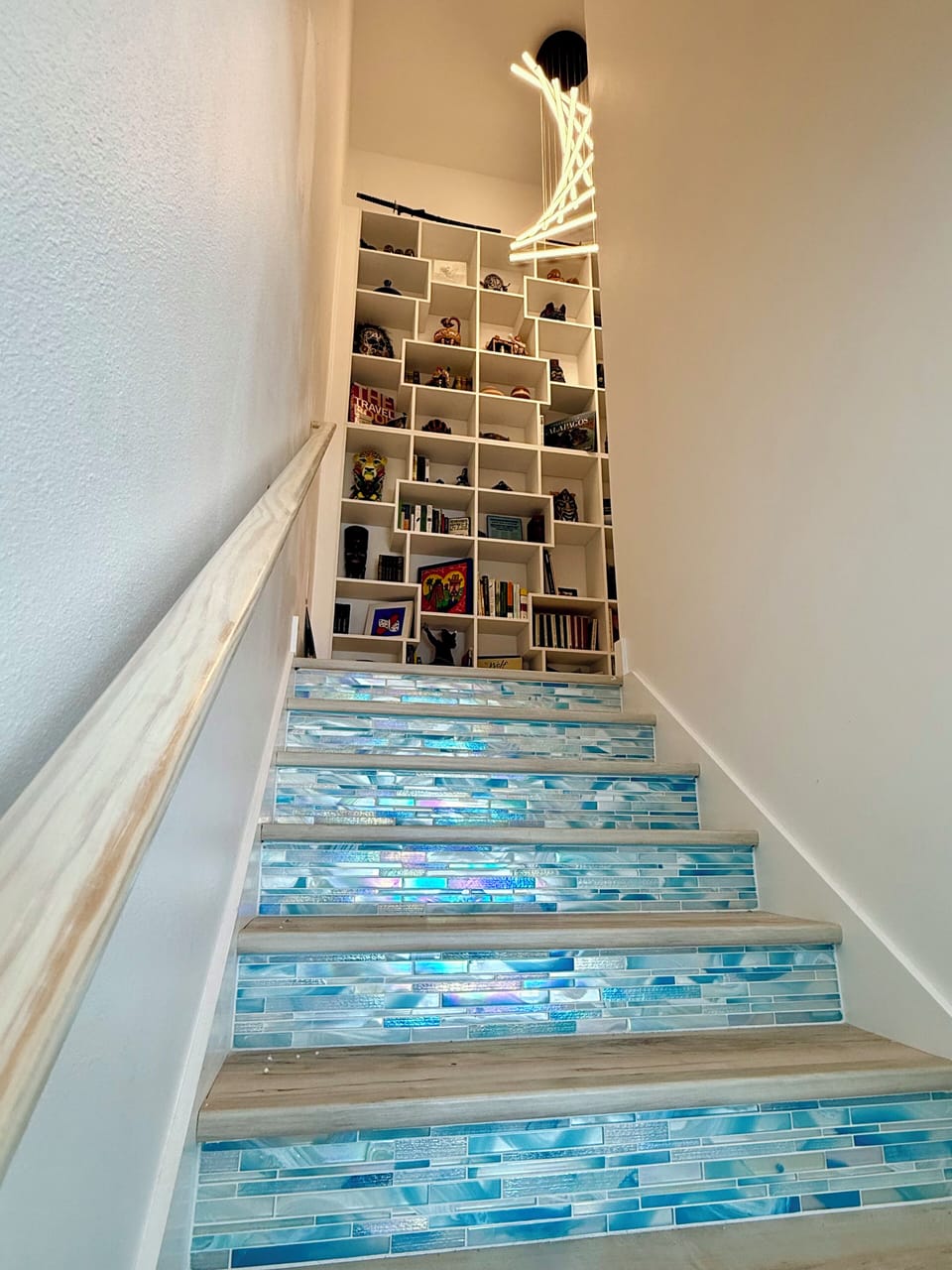 Even the stairs have tiled risers and art from our travels.