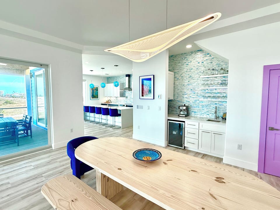 Beverage cooler in dining area wet bar and coffee station