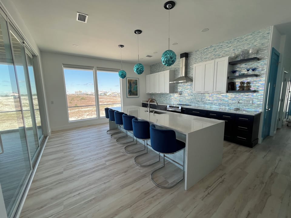 Seating for 6 at the kitchen island with double waterfall edges