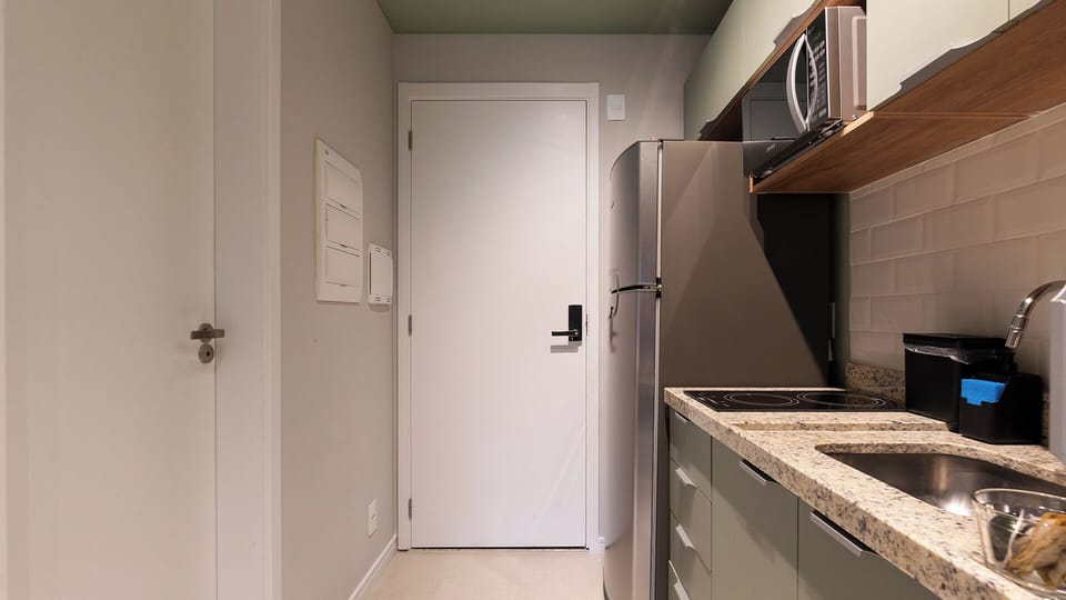 Classic Apartment | Private kitchen | Full-size fridge, microwave, stovetop, cookware/dishes/utensils