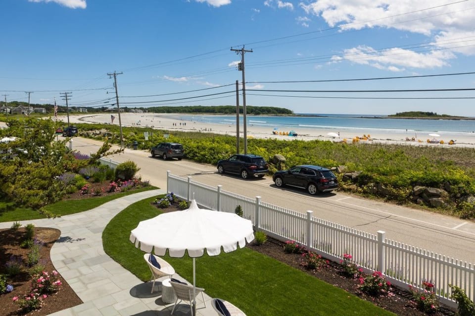 Enjoy stunning ocean views and direct beach access right from the charming outdoor seating area.