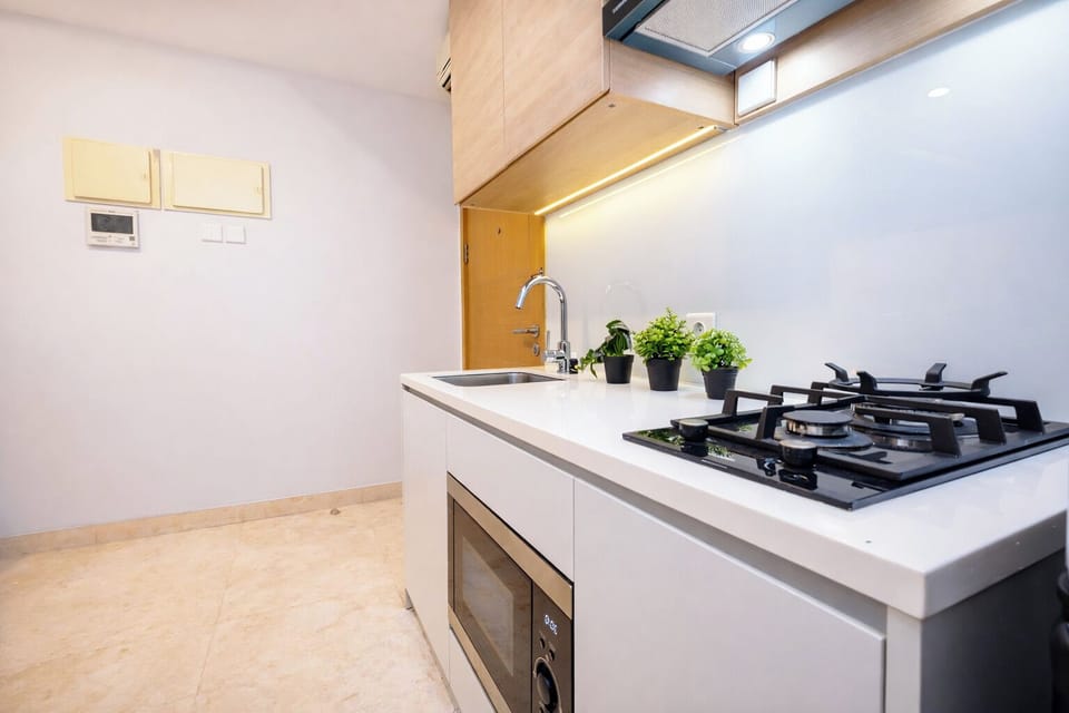 Standard Apartment | Private kitchen | Fridge, stovetop, electric kettle, cookware/dishes/utensils