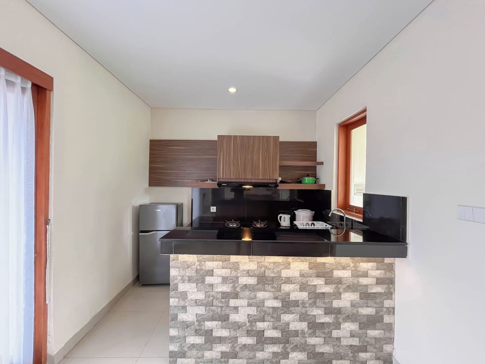 Standard Apartment | Private kitchen | Stovetop