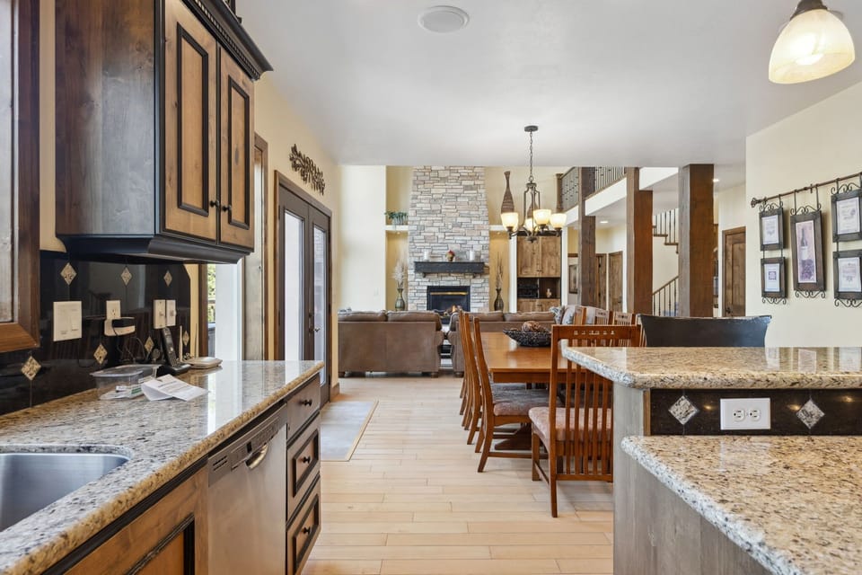 The great room, dining, and upscale kitchen flow seemlessly together, making gathering with friends and family easy and fun.