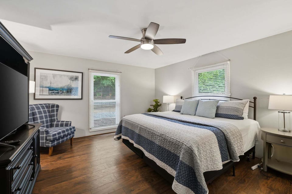 Main Level Primary Bedroom with king bed.