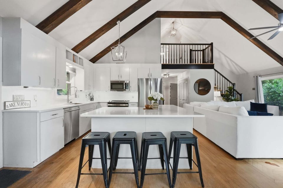 Fully stocked kitchen with island seating for 4.